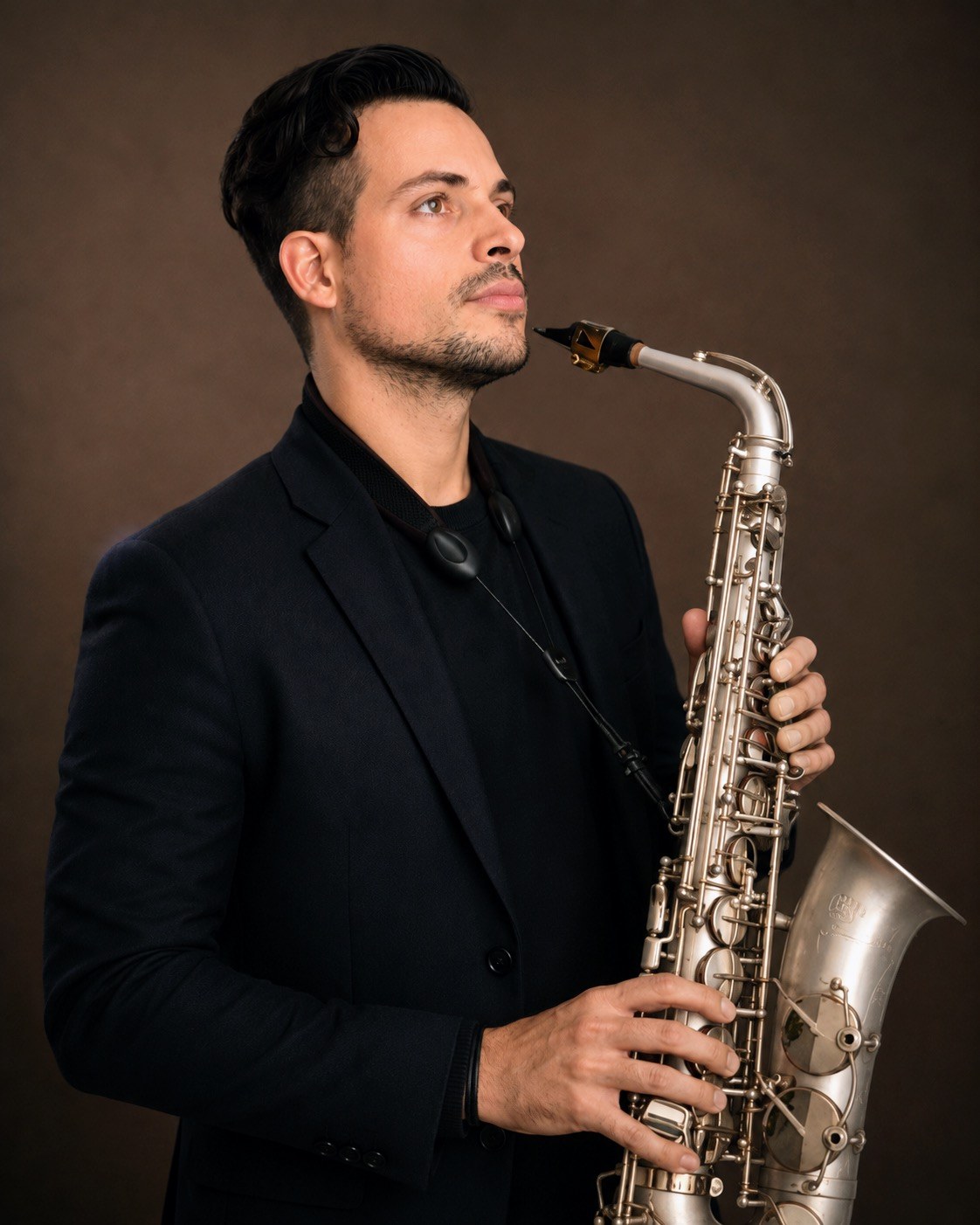 Rodrigo Belga · studio portrait with silver saxophone