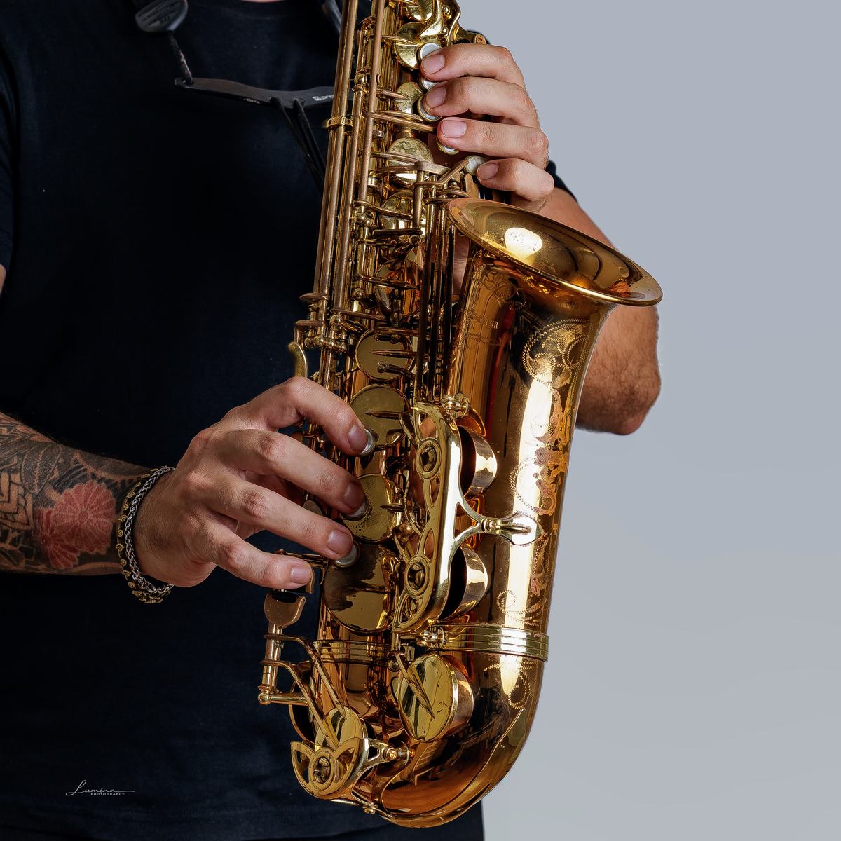 Rodrigo Belga close-up playing saxophone